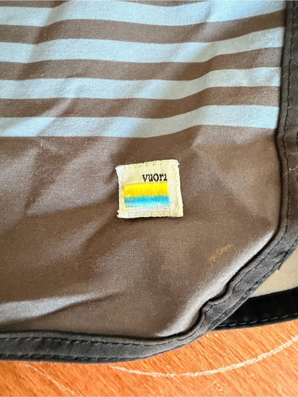 Vuori Men's Gray Swim Trunks with Light Blue Stripes